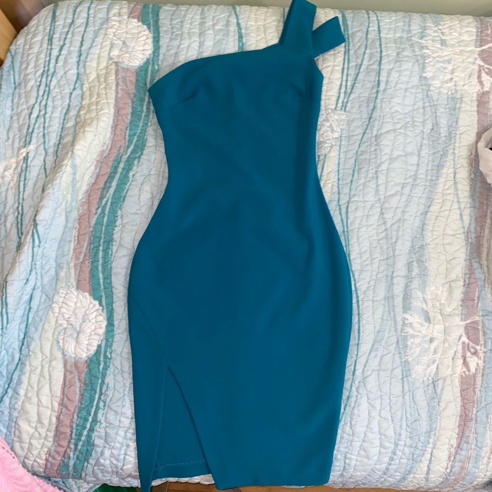 Likely teal dress